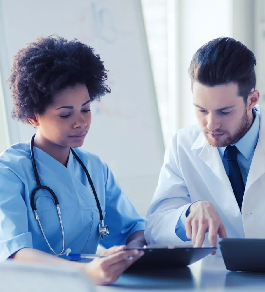 Medical research team looking over patient information of a clinical trial